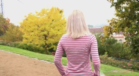Blonde teen Debora pulls aside cotton panties to pee on the steps in public 60181568