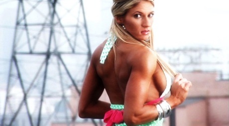 Blonde bodybuilder Abby Marie tugs on her pigtails during upskirt play 78308443