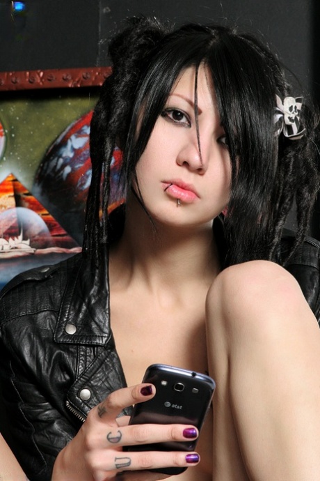Dark haired rocker Miss Seamonster showcases her bald slit in leather boots 55808879
