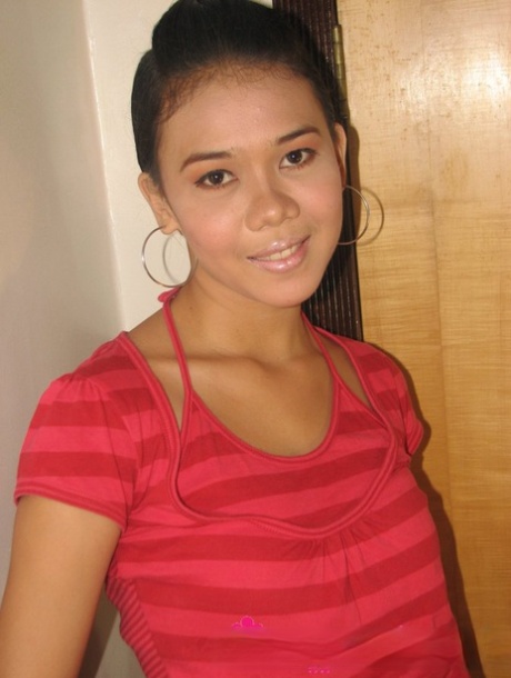 Filipina teen strips down to her birthday suit in front of a hotel room door 73469685