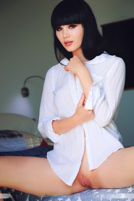 Dark haired model Malena F gets naked before donning a white blouse 22743820