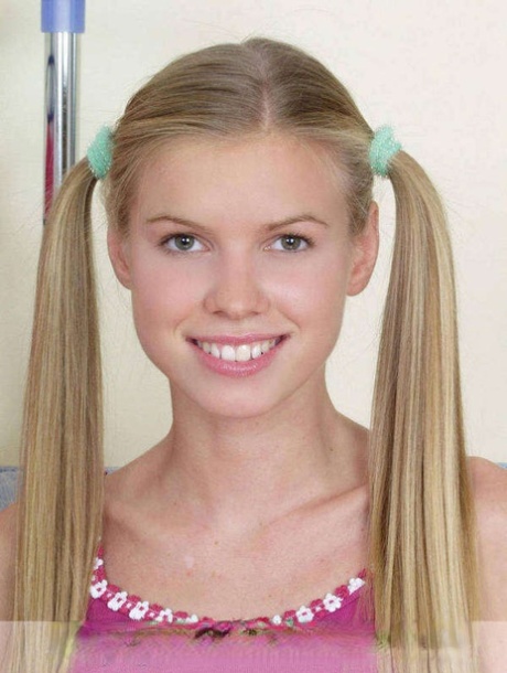 Young looking blond Marketa makes her nude debut with her hair in pigtails 15569468