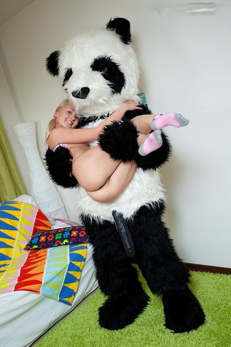 Young blonde Amelie Pure gets fucked by a Panda that sports a massive dick 75125261