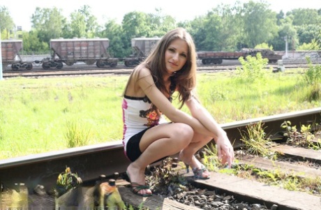 Young amateur Sveta displays her pussy on railway tracks with no panties on 66766818