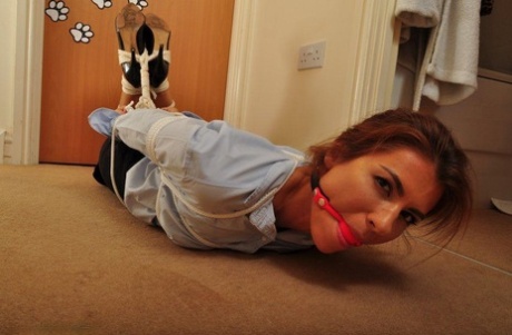 Caucasian chick is left hogtied and gagged in office apparel 16314128