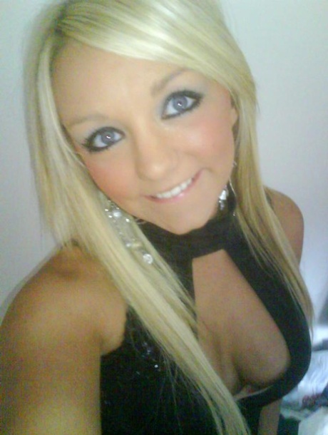 Blonde with big blue eyes takes candid self shots in a safe for work manner 75952737