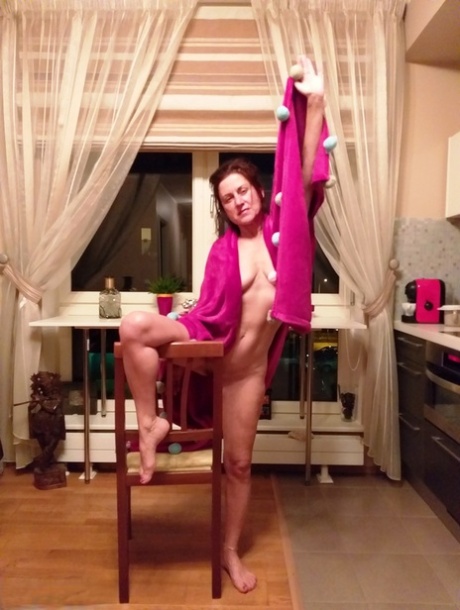 Mature amateur Diana Ananta exposes herself on a chair with the blinds open 50849505