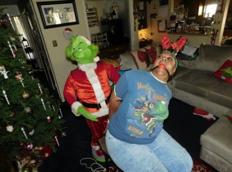 Overweight lady gets ball gagged and tied up by the Grinch at Christmas 59338508