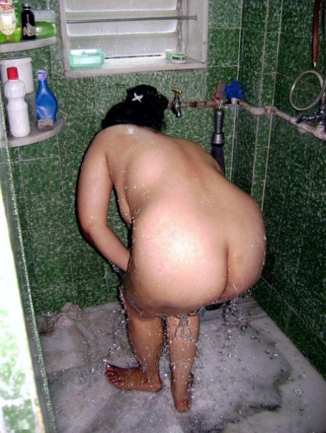 Indian fatty washes her clothes while taking a shower at the same time 73738409
