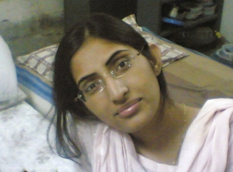 Indian girl takes selfies in a mirror while wearing a see-through tank top 92361171
