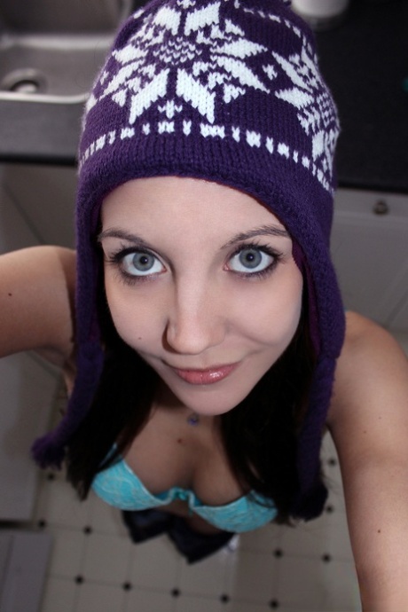 Amateur model Andi Land pulls down her pants while wearing a toque 93828042