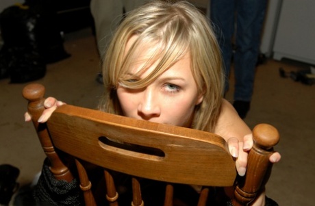 Young blonde girl is dildo fucked while lashed to a wooden chair 33370118