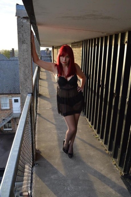 Older redhead Barby Slut exposes herself while wearing black lingerie 25955326