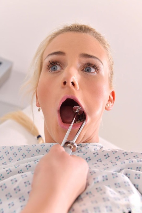 Blonde girl undergoes an anal exam and strapon fucking from a lesbian doctor 49908322