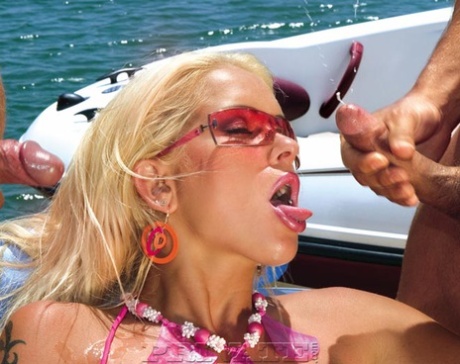 Hot blonde takes a cumshot on her pierced tongue after a DP on a boat 27641496