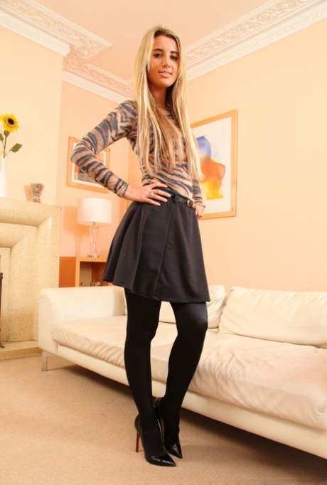 Tall blonde Hollie D models topless in black pantyhose and Louboutin heels 26276832