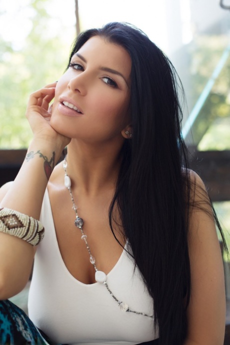 Brunette beauty Romi Rain gets naked in heels for a Penthouse solo shoot 24558103