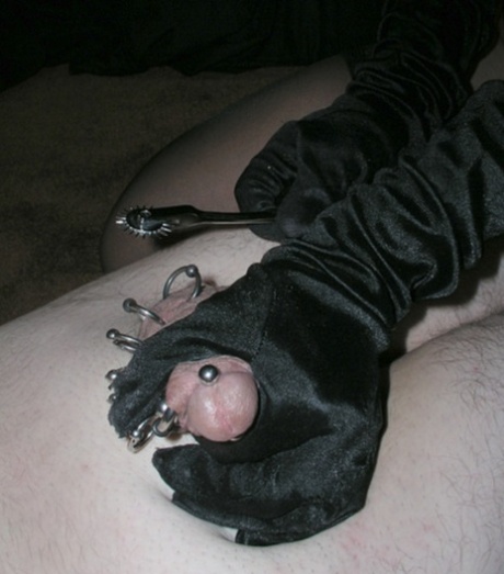Sexy girl Rubee Tuesday crushes a pierced cock in black velvet gloves 47568363