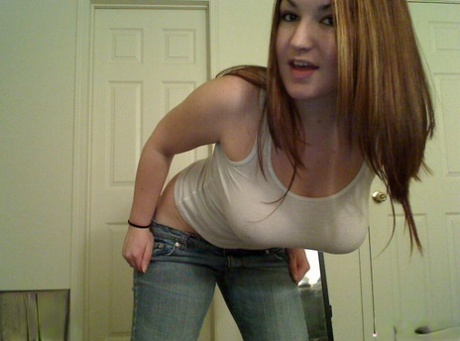 Girl next door type goes topless while at home in a teasing manner 26951105