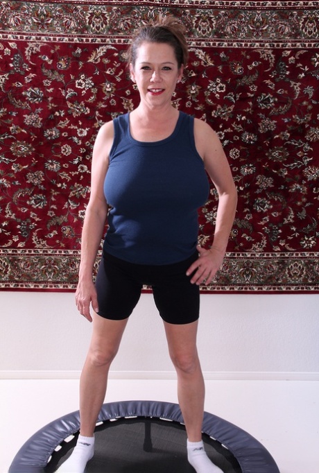 Over 30 woman Christy bares her great tits and twat during a home workout 81627807