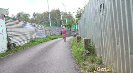 Tattooed blonde Caroli lifts up her dress to pee alongside a paved road 30156492
