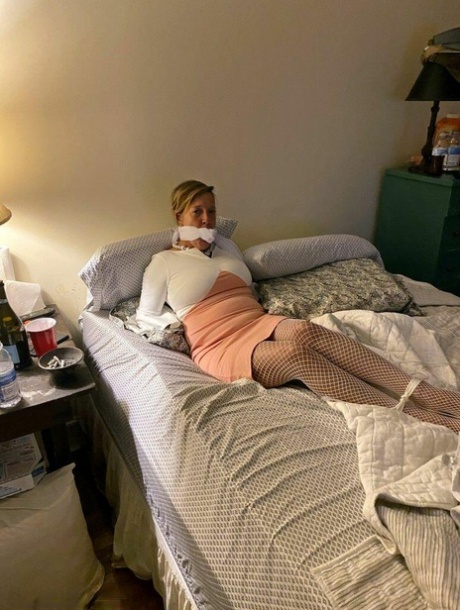 Amateur lady Meyer is gagged and restrained in various locations at home 50464270