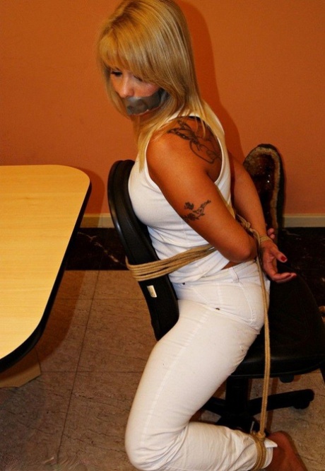 Blonde amateur is silenced with duct tape while tied to a desk chair 92189068