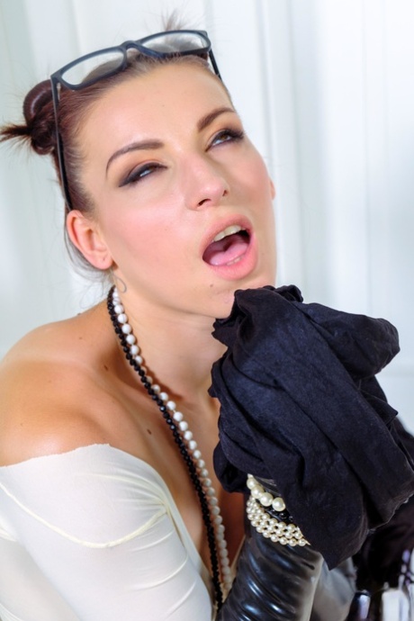 Solo girl Victoria Daniels plays with suction dildos in latex and hose 61203933