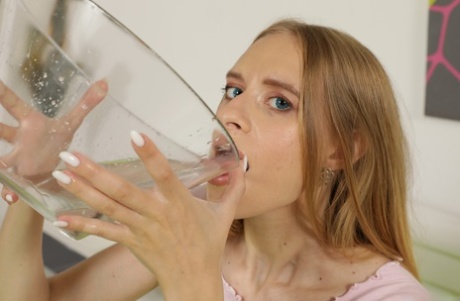 Leggy girl Nikki Riddle drinks her own pee during a masturbation session 88489794