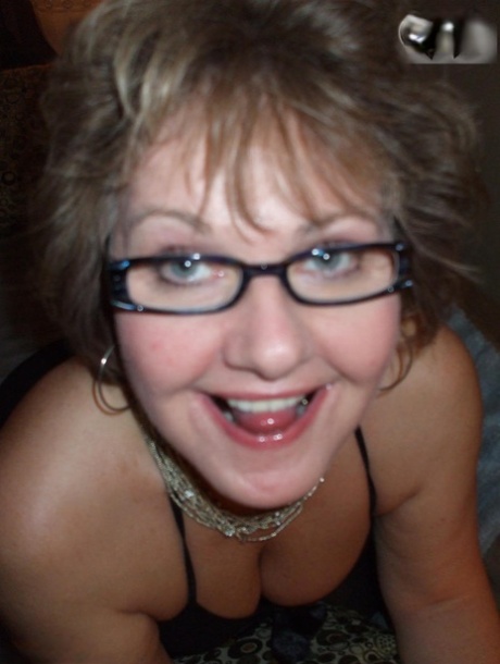 Older lady Busty Bliss shows her natural tits while playing with a sex toy 73859869