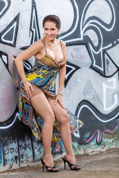 Mature wife Roni Ford removes dress and hose to model naked afore graffiti 86482621
