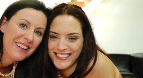 Amateur woman Lara Latex is joined by a young girl for a threesome in gloves 41439510