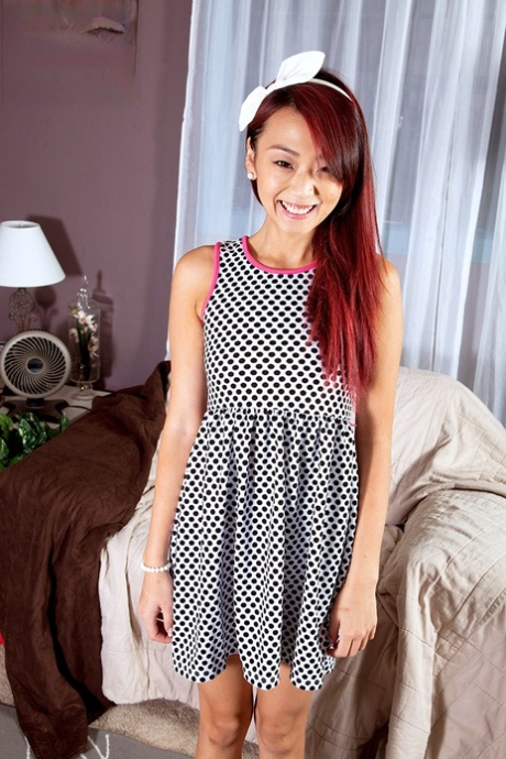 Cute Asian teen Layla Mynxxx takes off all her clothes for birthday number 18 51073738