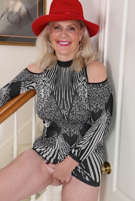 Thick granny Judy Belkins revealing big tits and ass while undressing 11053206