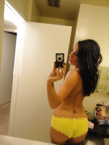 Brunette slut Tiffany Brookes taking mirror self shots while undressing 70679254