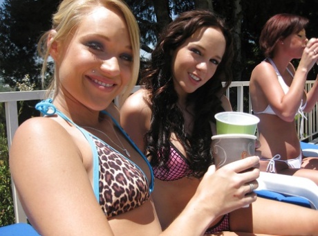 Lesbian babe Teagan Summers and her friends posing in the pool naked 22167406