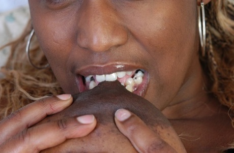 Fat black woman Lyric licking and biting own nipples after getting naked 85455181