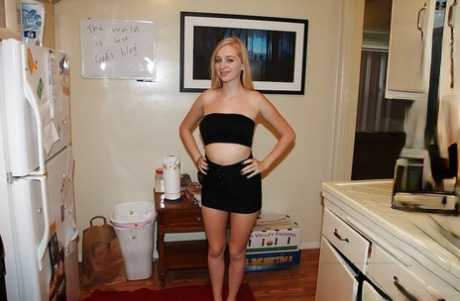 Teenage blonde Stacie Jaxxx slowly uncovering her fuckable curves 54433153