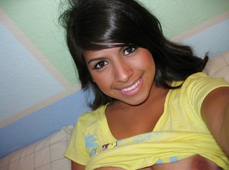 Smiley latina amateur Layla Rose showcasing her jugs and shaved slit 77776441