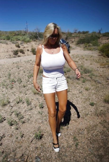 Playful blonde housewife in suglasses revealing her hot curves outdoor 71344488